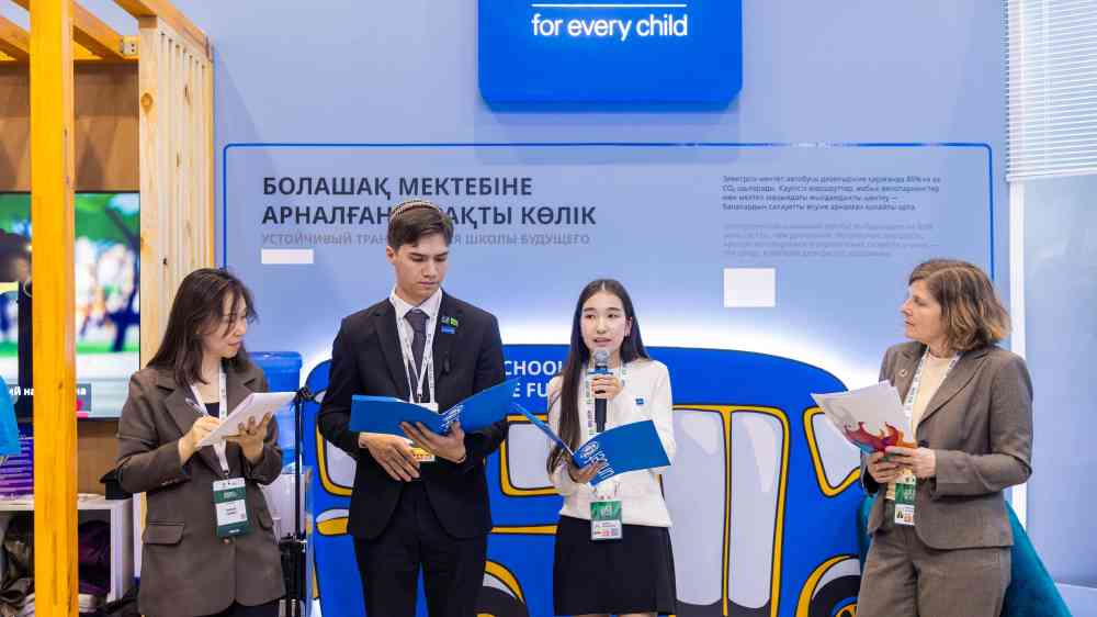 Two youth representatives talking at the launch event during the Regional Ecological Summit